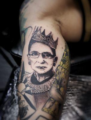 Stipple portrait tattoo of Ruth Bader Ginsberg.