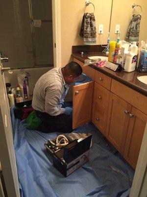 Picture of Ricardo working on the guest bathroom