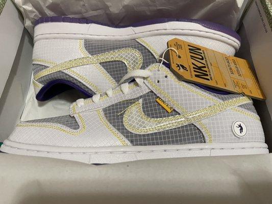 Raffle W on Union Dunk Low Purple