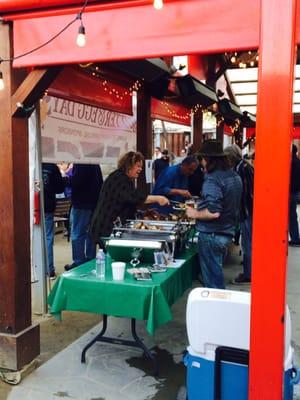 Volunteers serving Lombardi's food to the masses.