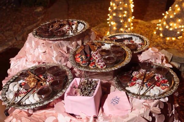 Dessert table: toffee bark, fruit tarts, chocolate creme brûlée, Mexican wedding cookies and white chocolate raspberry tarts