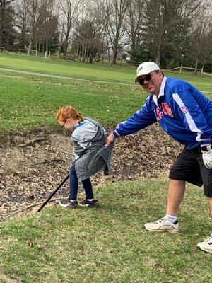 Special Picture Moment with my Granddaughter.   Retrieving a ball from the creek.