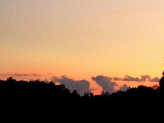 Sunset at Chris Green Lake, looking at distant storm clouds