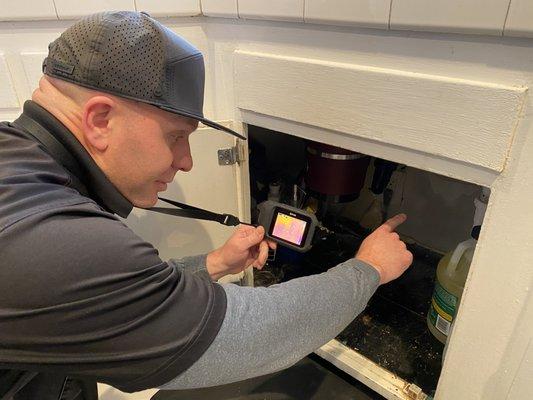 Thermal imaging infrared scan included with every inspection. Here I find a plumbing leak under a kitchen sink.