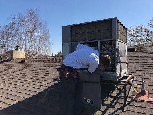 Working on a roof top unit