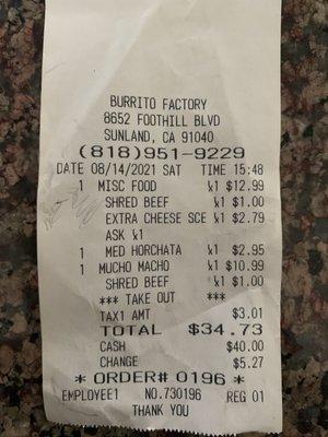 Receipt of overpriced shredded beef and cheese burrito