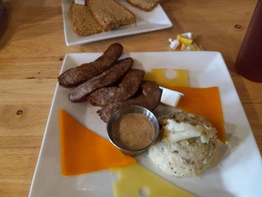 Bangers and mash appetizer.