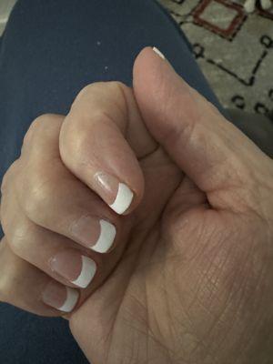 One third of my nail is white, cut so short my finger shows at the tip.