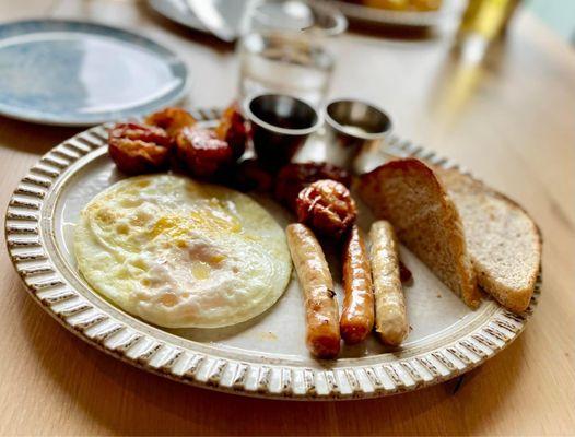 Two Egg Breakfast with Sausage, Smashed Potatoes and Sour Dough Toast