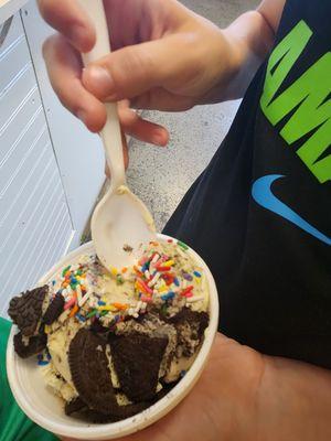 Oreo ice cream with oreo pieces and sprinkles