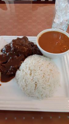 Oxtails and white rice and beans.