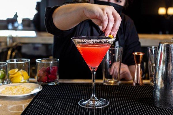 Enjoy a happy hour cocktail at III by Wolfgang Puck