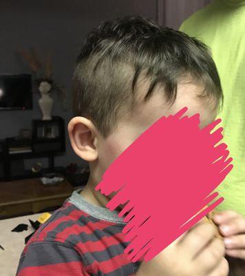 This is their version of a Mohawk.... check out the uneven mop on his head with spider legs falling down.. this is not a joke.