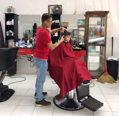 Customers of all ages come to get haircut (photo taken in Feb 2020)