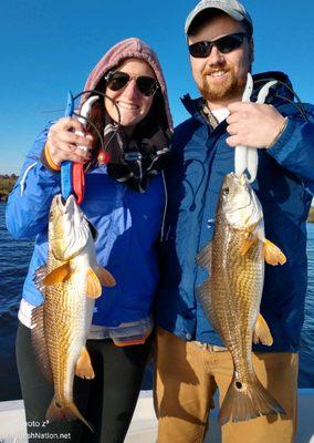 These newly weds loved catching redfish side-by-side at the same time, doubled-up!