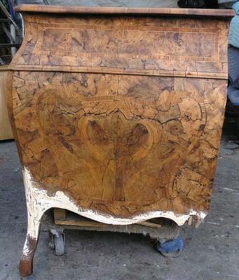 18TH century German Baroque chest of drawers. Before restoration-missing leg withe  spots outline missing veneer veneer.