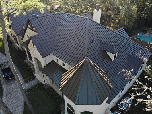 This beautiful custom home was made exceptional with their metal roof selection.