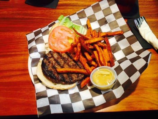 House burger with sweet potato fries.