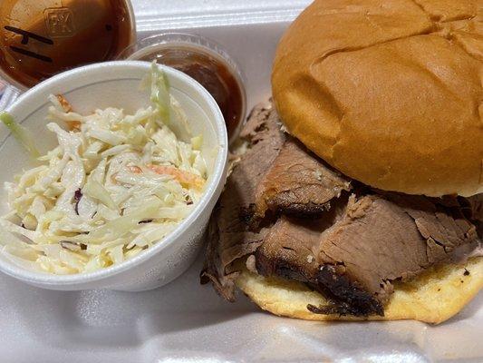 Brisket sandwich with side of coleslaw, and because I love spicy the barbecue sauce was a perfectly match. Buns were fresh.