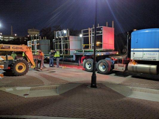 truck and fork lift parked illegally blocking the intersection and cross walks.