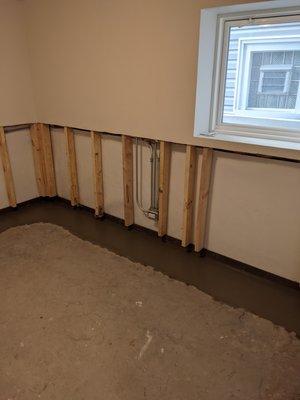 Bedroom wall. Day 3. New concrete floor.