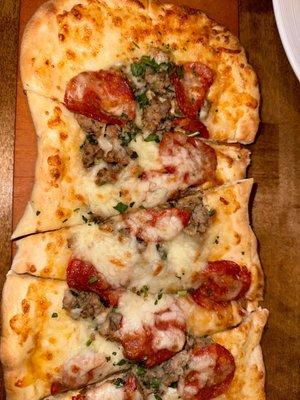 Sausage and pepperoni pizza