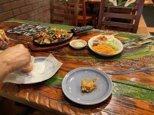 Fajita with chicken,steak and shrimp. The empanadas were pack with flavor and so was the fajitas.