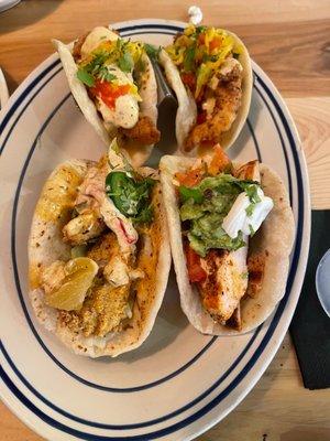 Top two are fried chicken pickle tacos Fish taco Grilled chicken taco