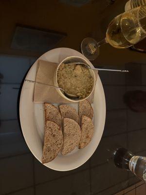 Chickpea dip appetizer and glass of Josh SavBlanc.