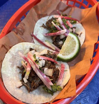 Beef barbacoa tacos - looks bigger but only in the photo.