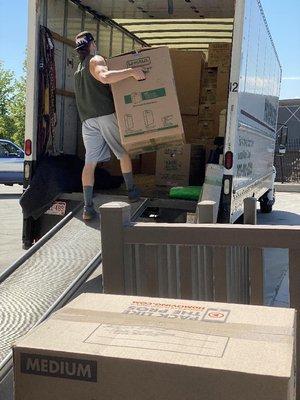 Jack using his UPS experience to load the truck properly.