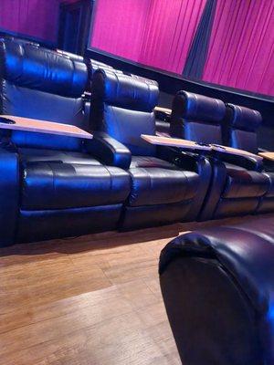 Electronic reclining seats (very comfy) with movable tables