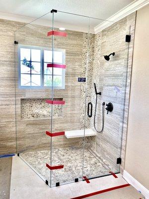 8' tall frameless shower with custom angled walls