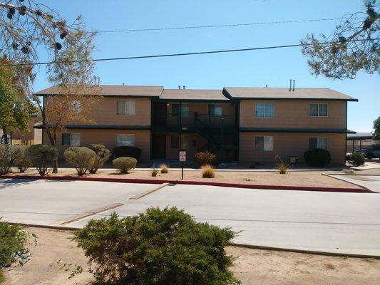 Newly painted and shingled buildings.