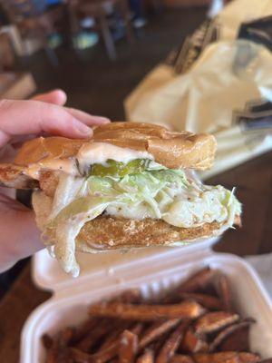 Pickle chicken sandwich: provolone, pickles, slaw, Texas Pete, brioche bun, grilled chicken