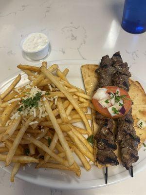 Steak skewer with the feta fries