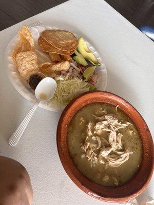 Green pozole Thursday special with chicharon , 2 taquitos, and 2 tostada's and avocados..