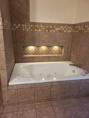 All custom tile , jacuzzi tub, lights and more