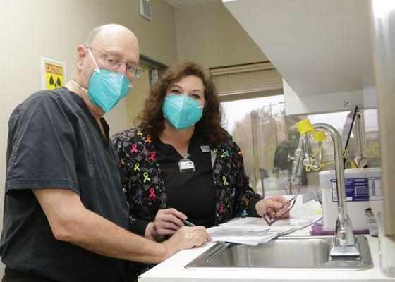 Steven A. Davis, MD and Radiation Therapist Kelli discussing a treatment at the Dermatology & Laser Center of San Antonio