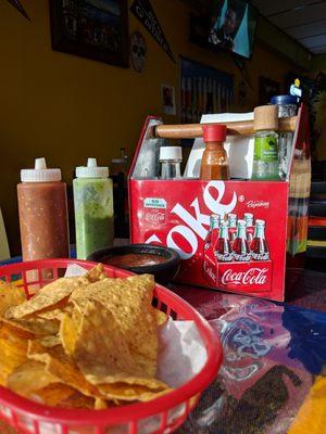 Fun intro. Chips, several sauces, including 2 home made ones.