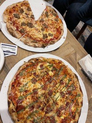 Spicy Italian and sausage pizzas