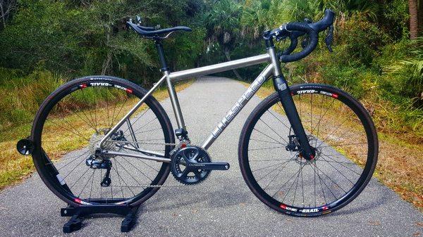 Litespeed T5g custom build. Titanium is a great material for bicycles. Extremely resilient, light, and can last forever.