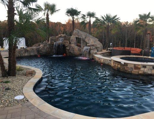 Custom Pool with grotto, slide and oversized spa