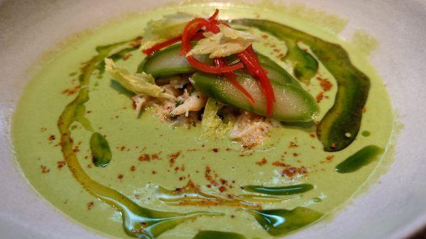 Spring asparagus soup with crab meat.