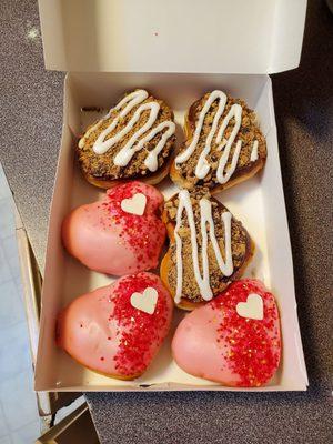 Valentine's Day doughnuts. You Color My World and Without You I'd Crumble doughnuts.