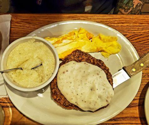 Country Fried Steak w/ Sawmill Gravy, Grits, Scrambled Egg w/ Cheese