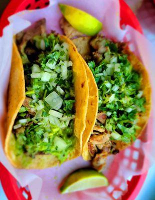 A Pollo and a Carne Taco with guac - YUM!