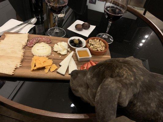 Charcuterie board was delightful and tempted the pup.