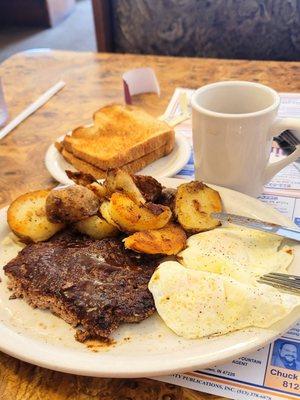 8/13/22 another great breakfast. Chop steak eggs over medium sliced fried potatoes coffee wheat toast.