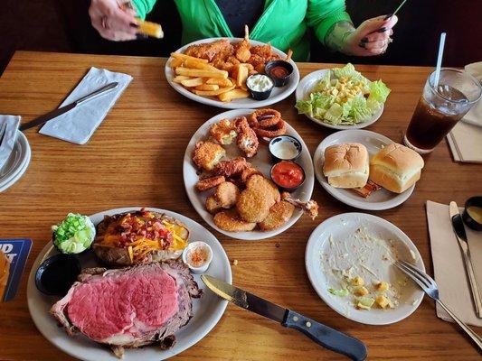 16oz prime rib and the seafood combo and a sampler appetizer